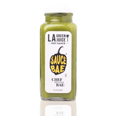 Sauce Bae LA Green Juice Hot Sauce bottle on white backdrop with reflection.